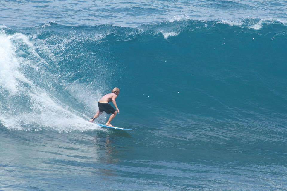 Alexander surfing in Uluwatu Bali