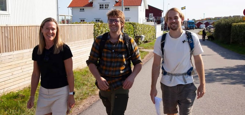 Three-employees-walking-together-outside