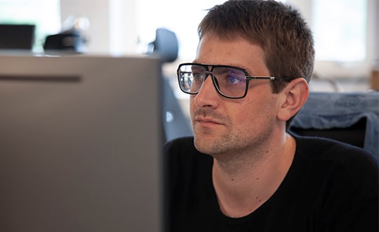 A photo from the office showing Tobias Pasma, Zooma's HubSpot Solutions Architect