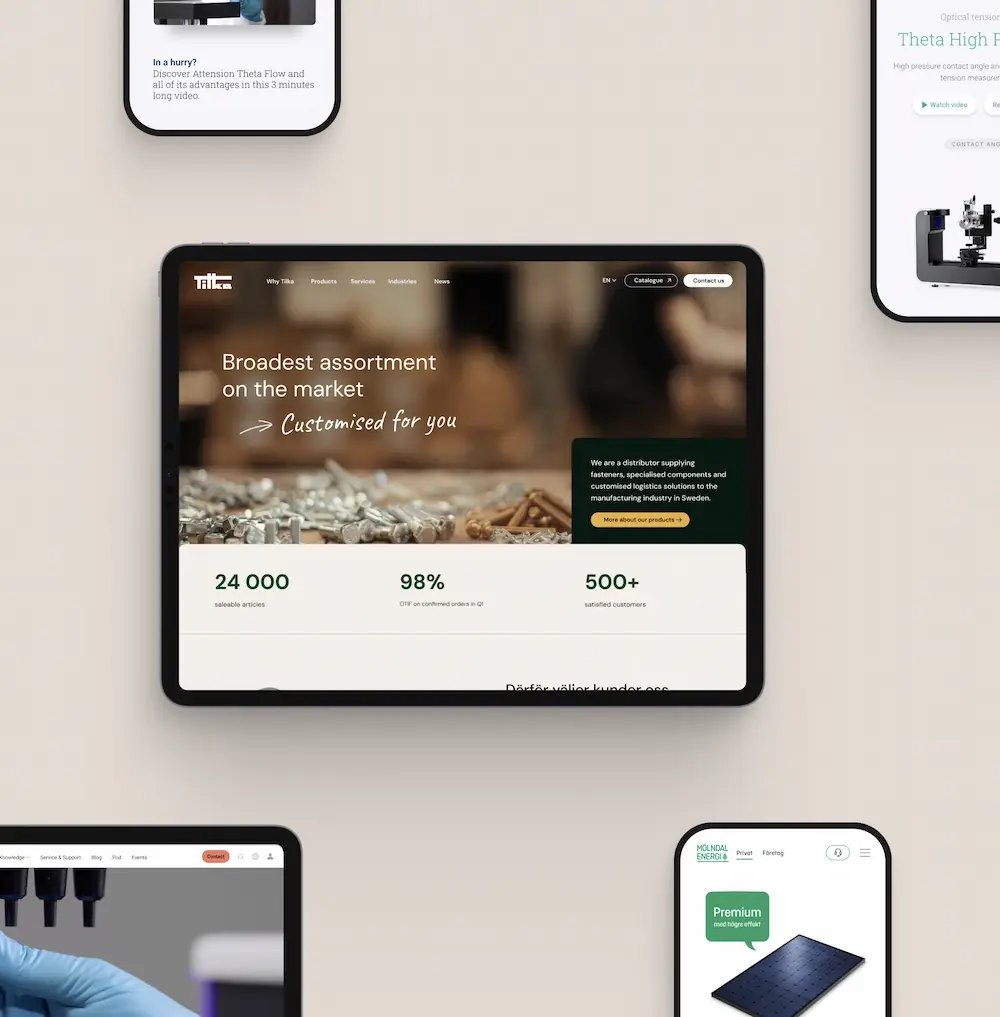Tablet and mobile devices displaying modern website designs on a light background