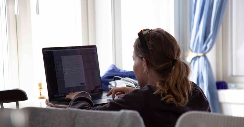 Women sitting in front of laptop