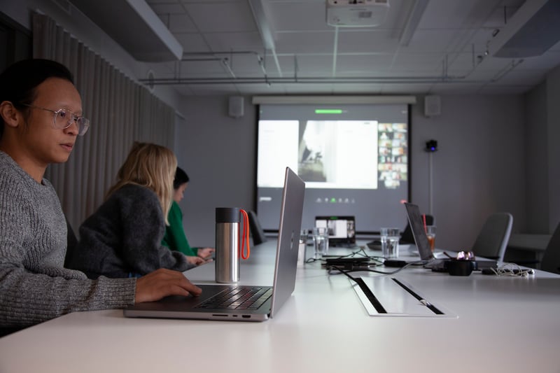 Zooma-People-having-a-meeting-in-conference-room