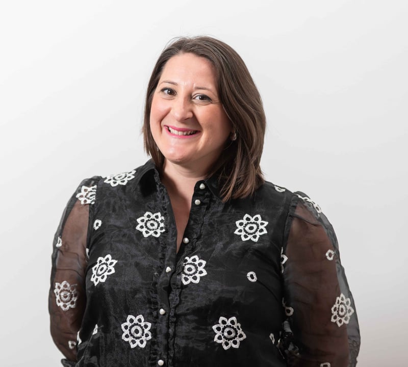 Floriane standing smiling